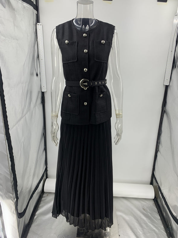Black belted vest and pleated mesh skirt two-piece set in a Sleeveless Chanel style ensemble