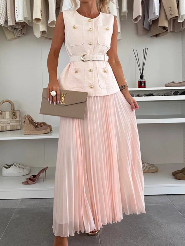 Woman wearing a pink pleated dress from the Sleeveless Chanel style vest two-piece set