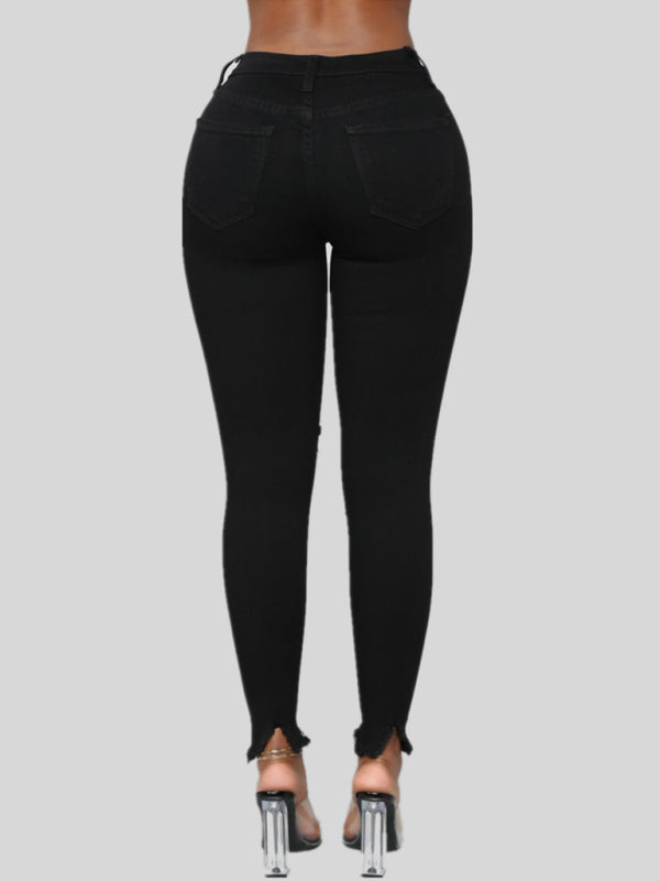 Women’s elastic ripped solid color denim long trousers