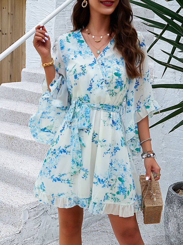 Elegant printed strappy dress with floral print and belted design for women