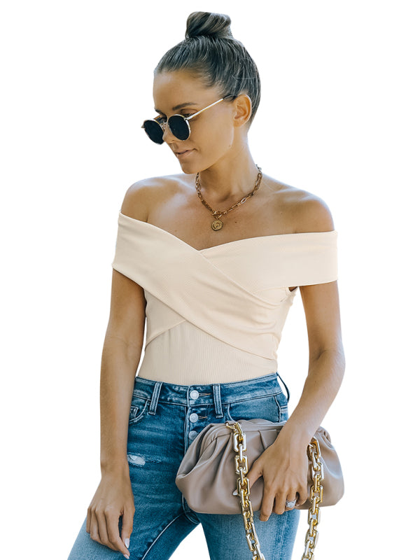 Woman wearing a beige fashion skinny off-shoulder top with slight elasticity
