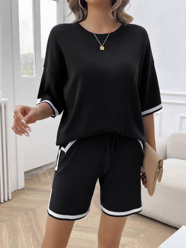 Black and white lounge set for women, essential clothing item with size chart included