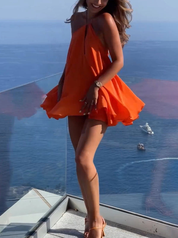 Flowing orange dress from Women’s Sexy Deep V-Neck Backless Suspender Loose A-Line Dress